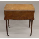 A George III mahogany Pembroke table. 47 cm wide flaps down.