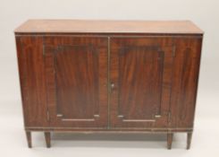 A 19th century mahogany side cabinet. 126 cm wide.