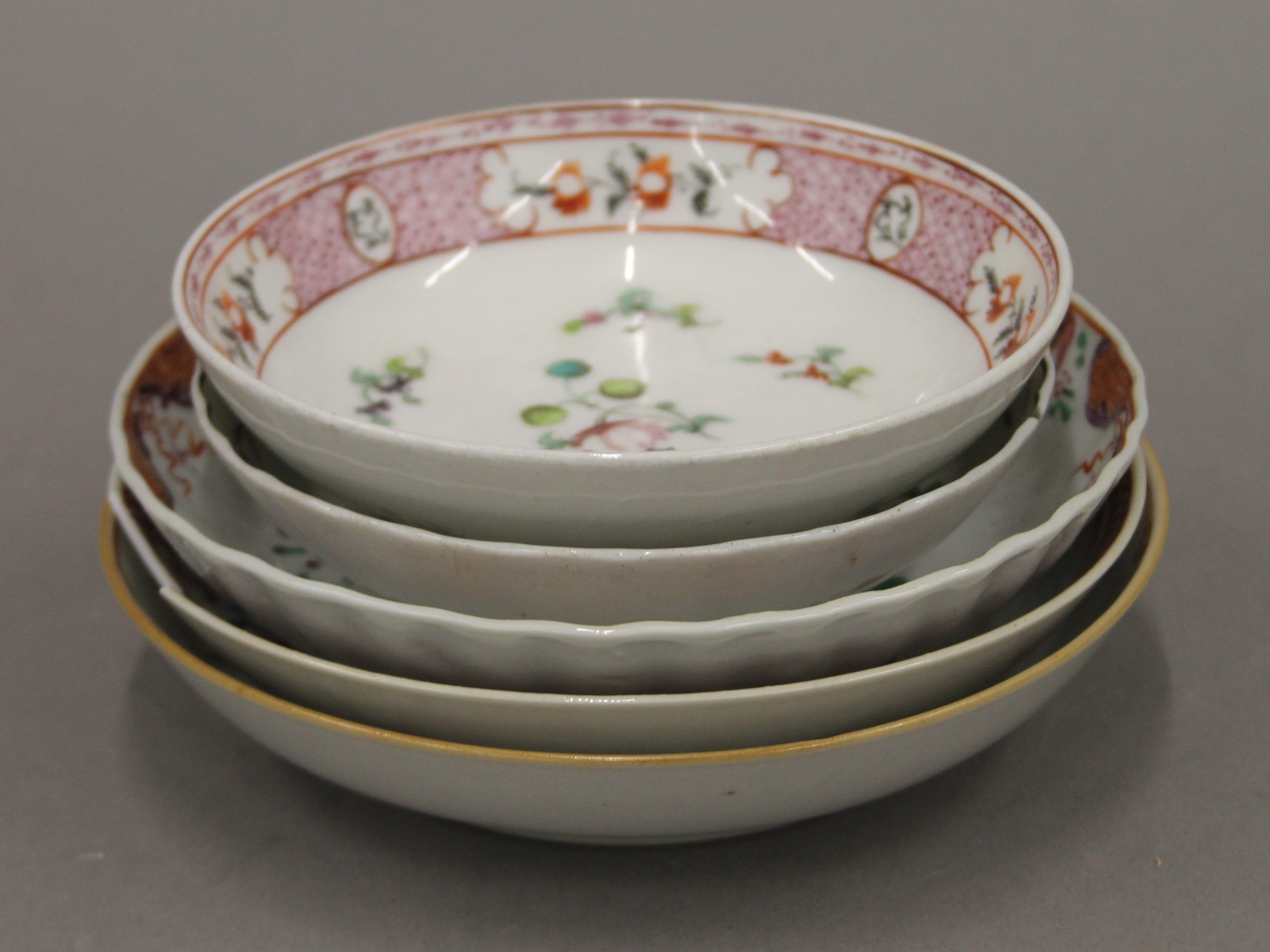 A collection of five 18th century porcelain dishes including New Hall. The largest 16 cm diameter. - Image 2 of 3