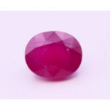 A loose ruby, 2.5 carats. 1 cm high.