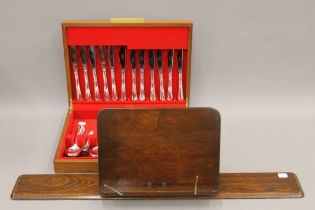 A cutlery canteen and a reading stand. The latter 76 cm wide overall.