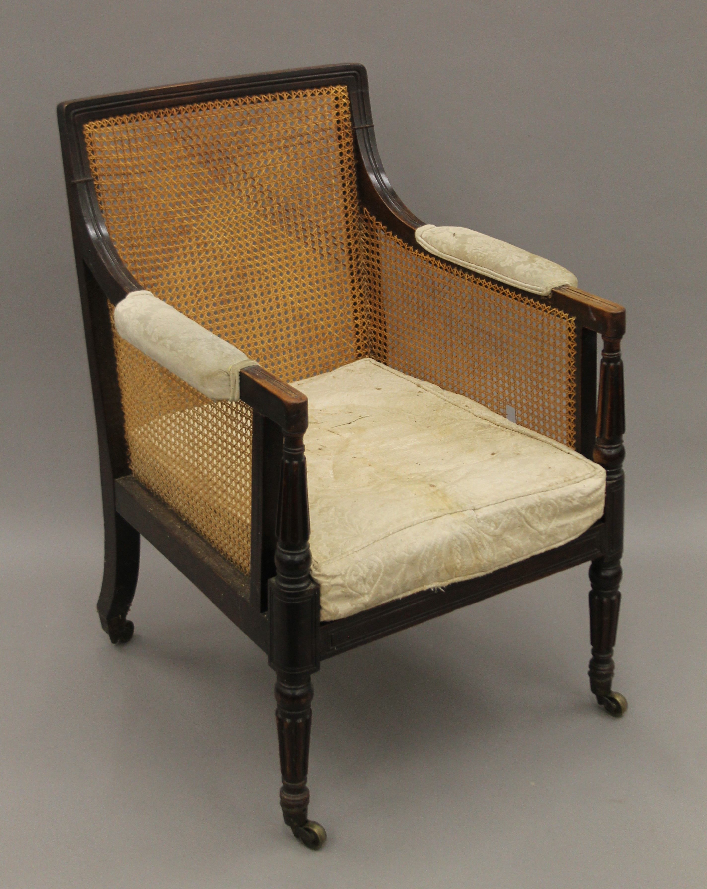 A 19th century mahogany bergere chair. 65 cm wide. - Image 3 of 5