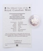 A 1996 Canada silver maple leaf 5 dollar coin, with certificate of authenticity.