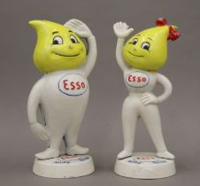 A pair of cast iron Esso money boxes. The largest 24 cm high.