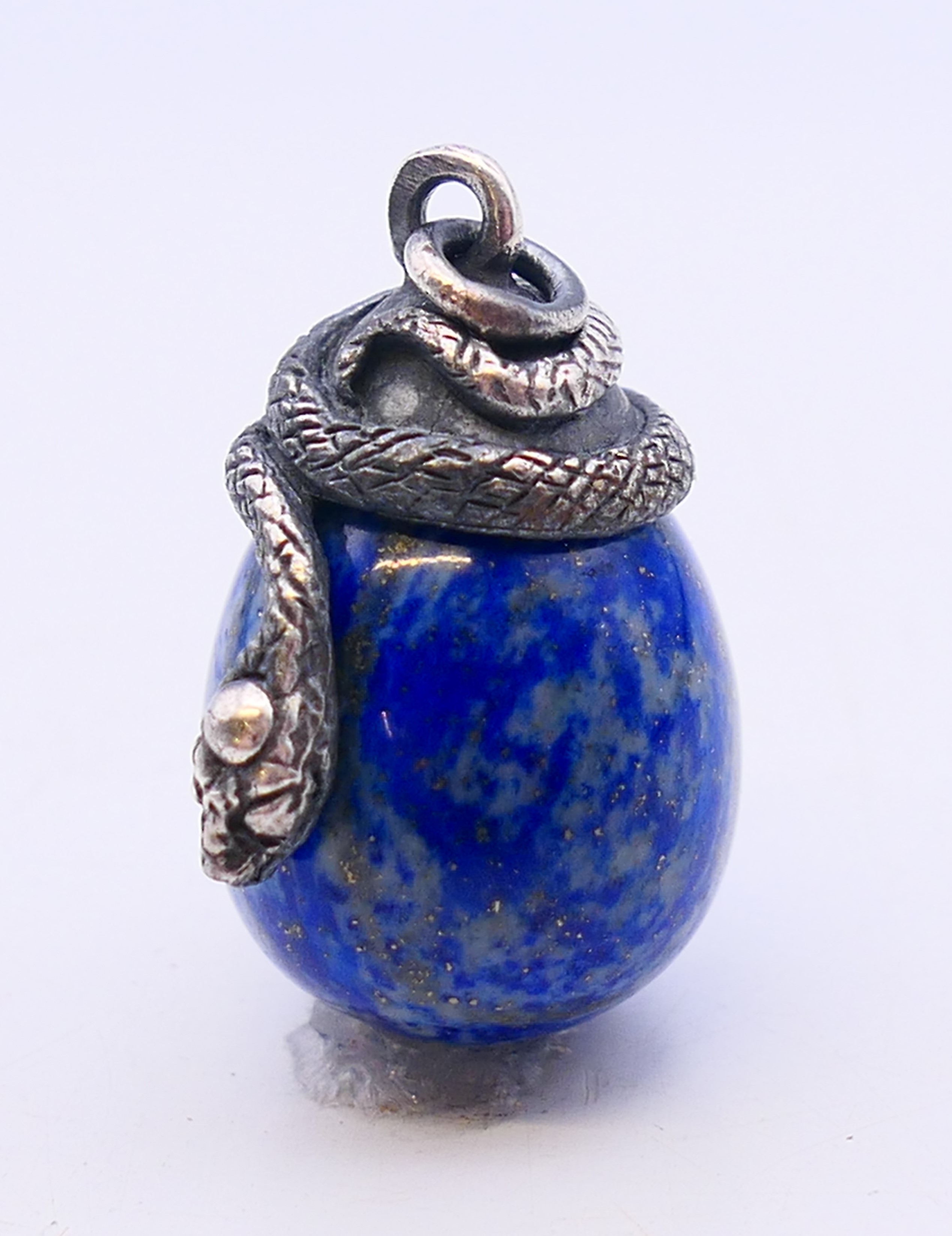 A silver and lapiz egg and snake pendant. 2.5 cm high. - Image 3 of 4