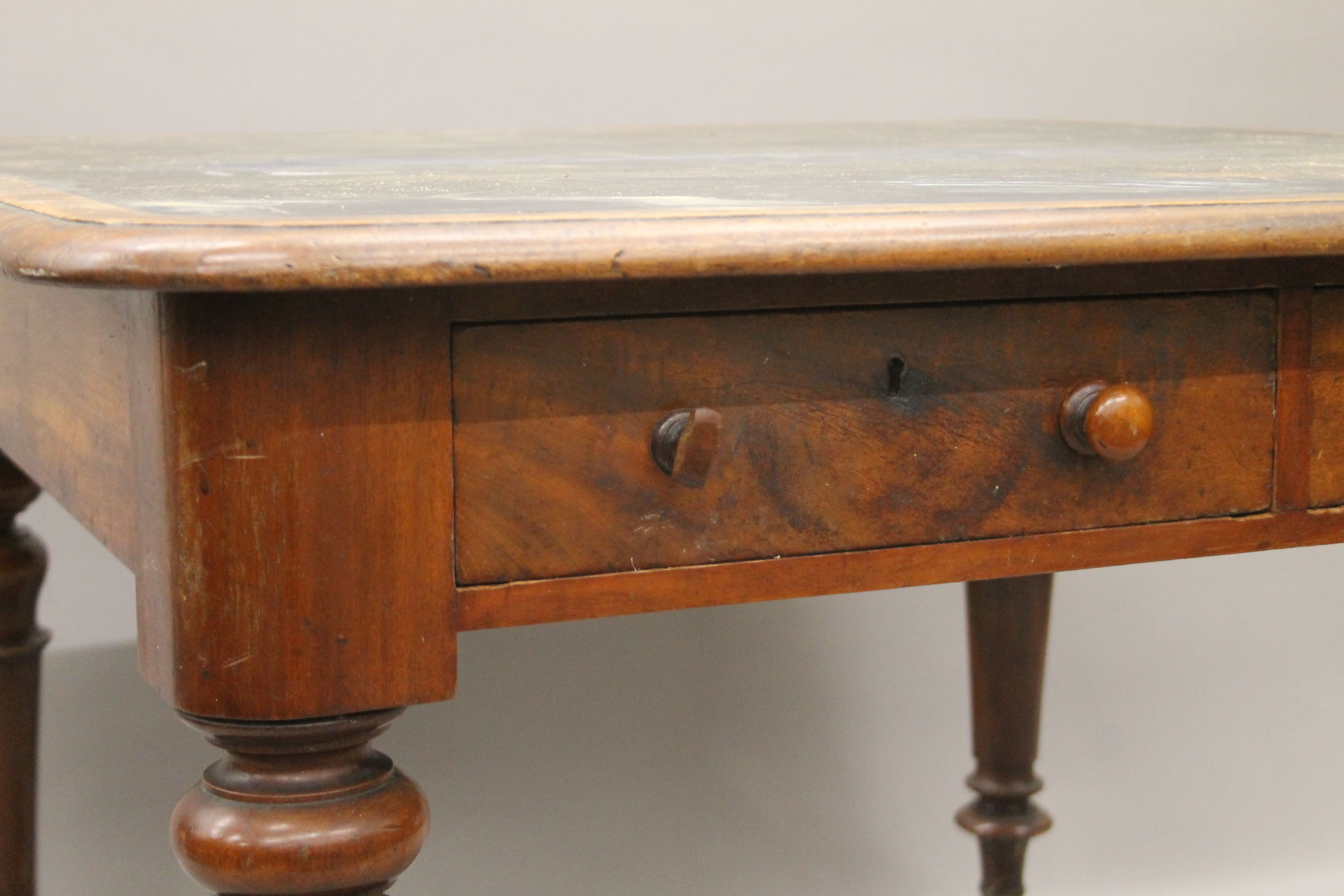 A Victorian mahogany two drawer writing table. 103 cm wide. - Image 3 of 5
