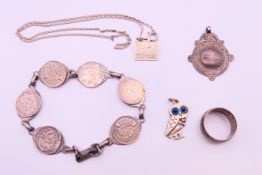 A small quantity of silver jewellery to include a ring, necklace, bracelet, fob and an owl pendant.