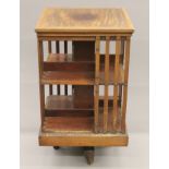A Victorian mahogany revolving bookcase. 49.5 cm wide.