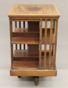 A Victorian mahogany revolving bookcase. 49.5 cm wide.