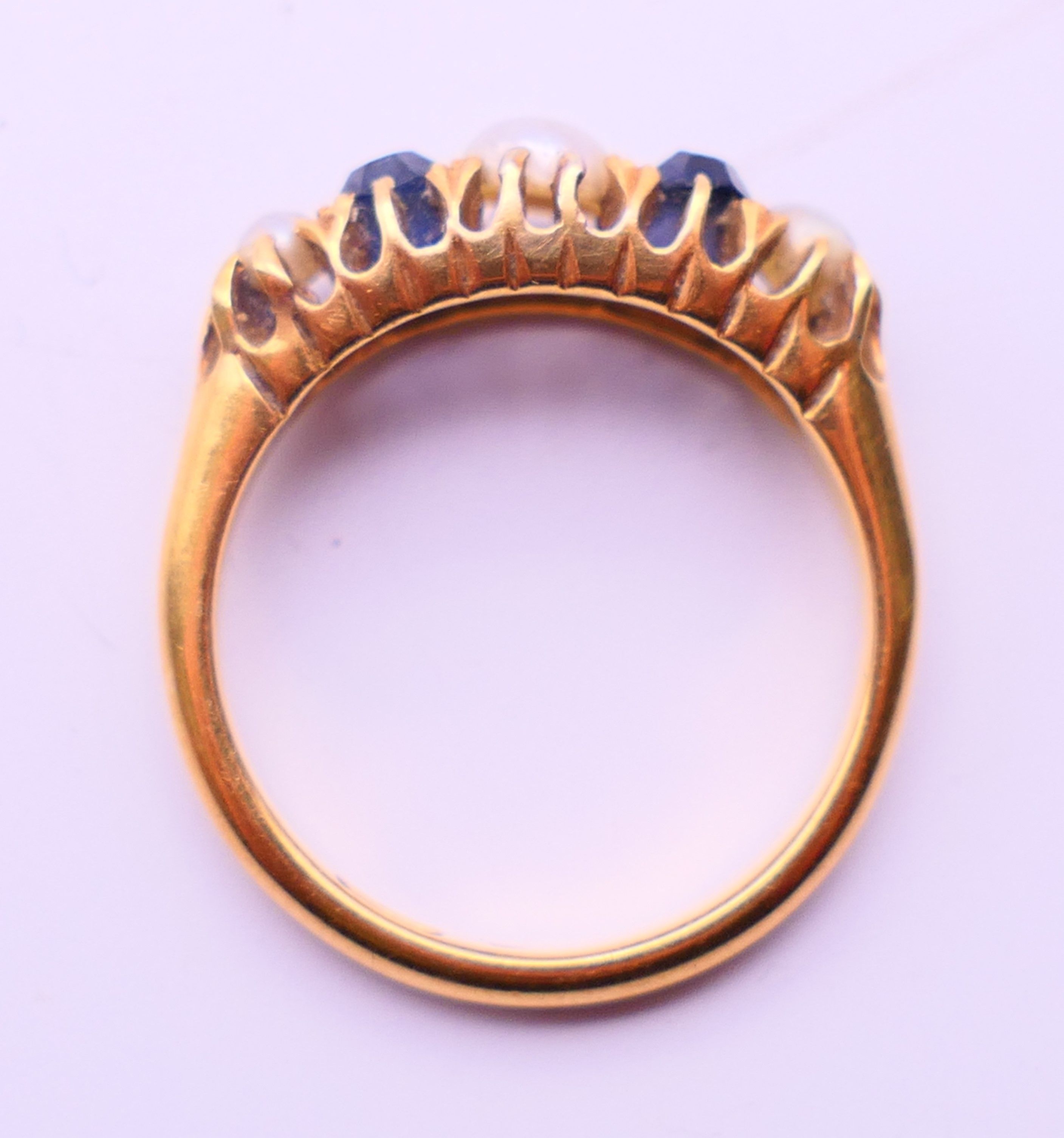 An 18 ct gold, seed pearl and sapphire ring. Ring size N. - Image 7 of 7