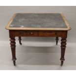 A Victorian mahogany two drawer writing table. 103 cm wide.