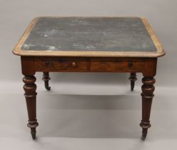 A Victorian mahogany two drawer writing table. 103 cm wide.
