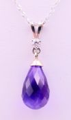 A 9 ct white gold, diamond and amethyst pendant on a 9 ct white gold chain. Pendant 2.