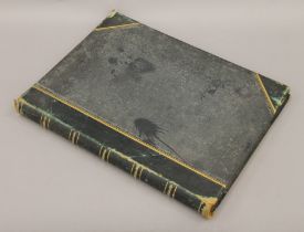 A Victorian photograph album of Paris. 33 cm wide.