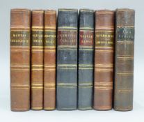 A collection of early leather-bound volumes of popular novels by Charles Dickens,
