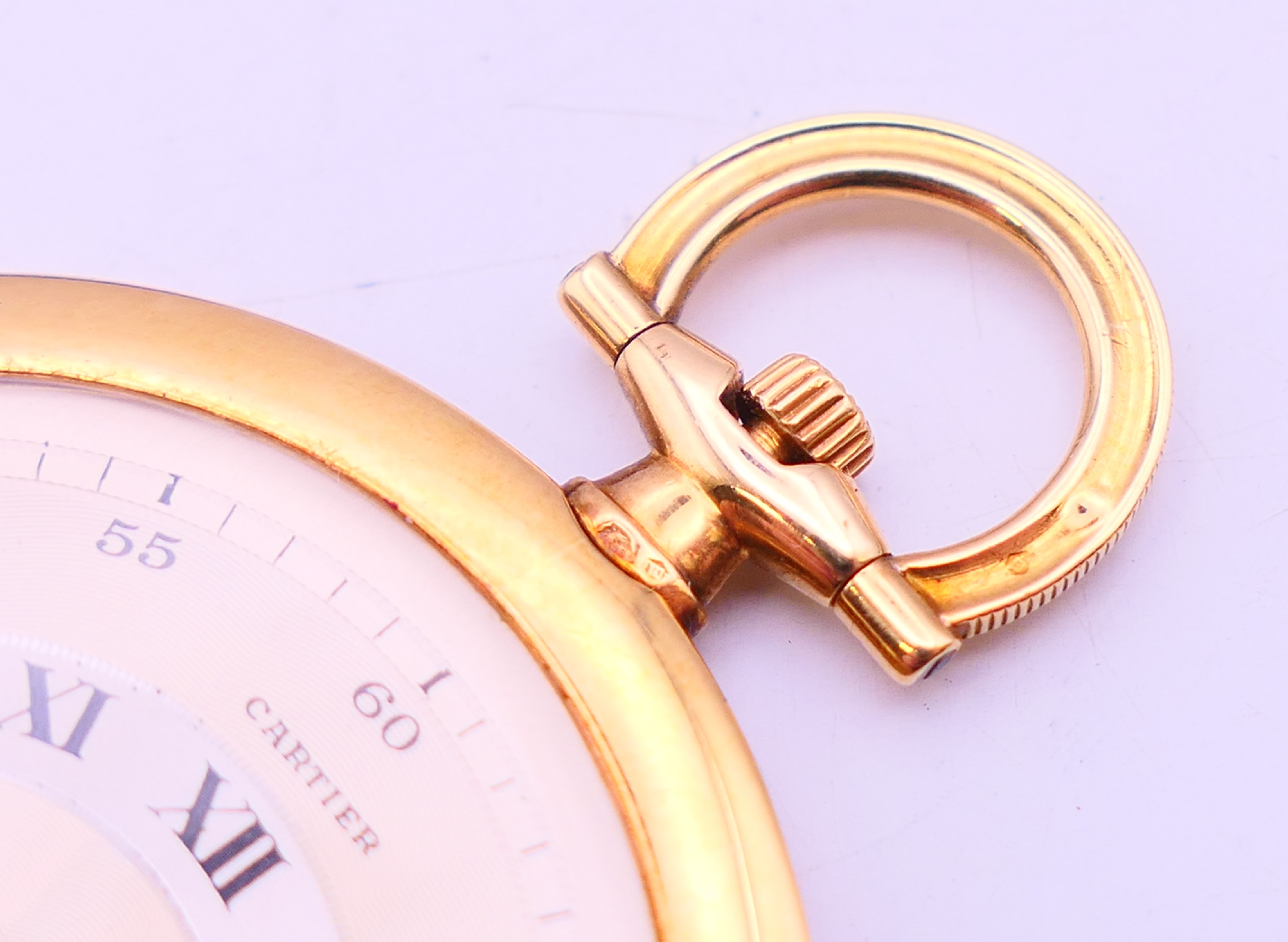 An 18 ct gold Cartier slimline open face pocket watch on black enamel 14 ct gold chain together - Image 6 of 15