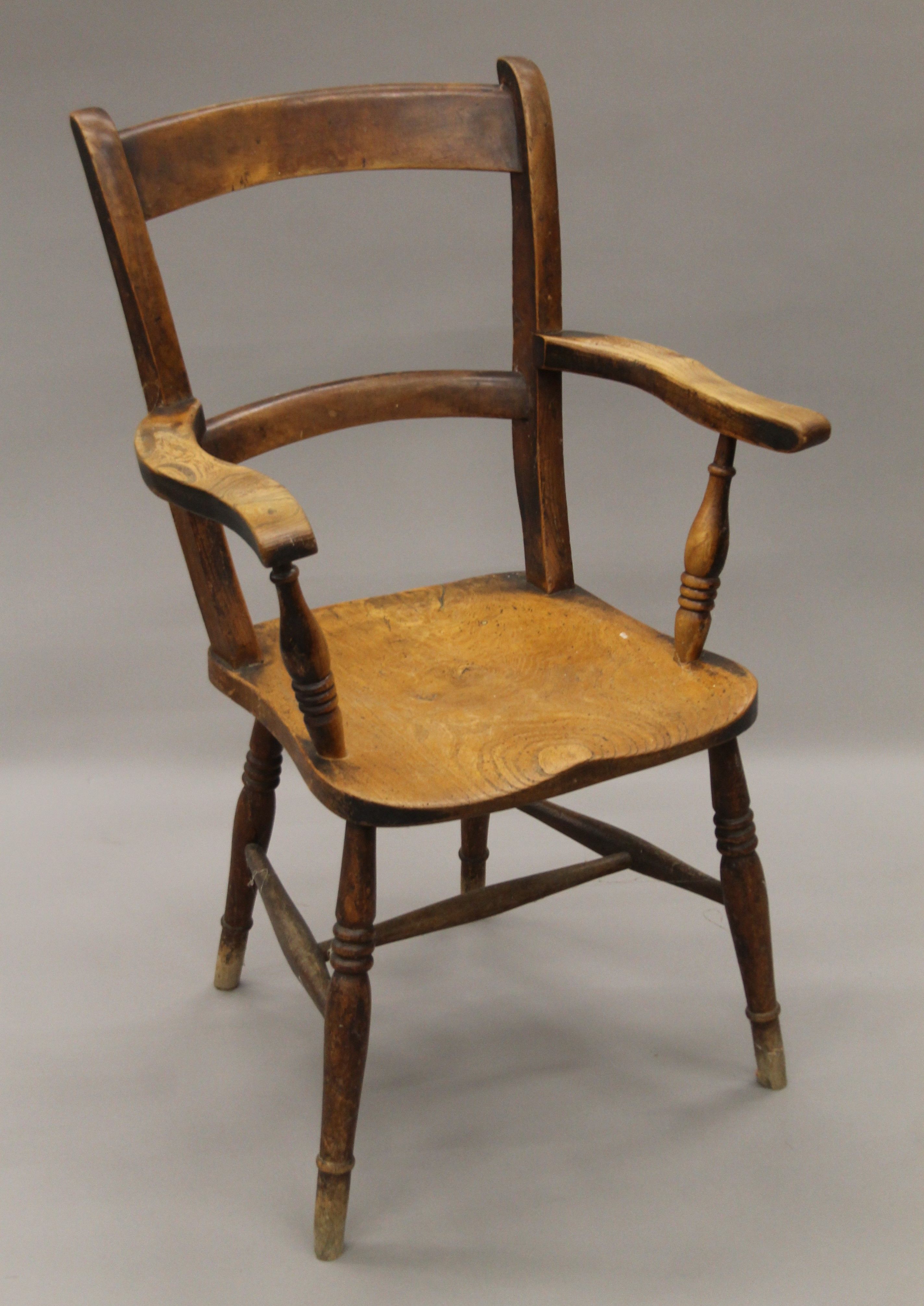 A 19th century elm seated open armchair. 56 cm wide. - Image 3 of 5