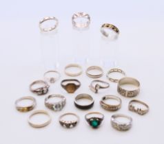 Twenty vintage silver rings.