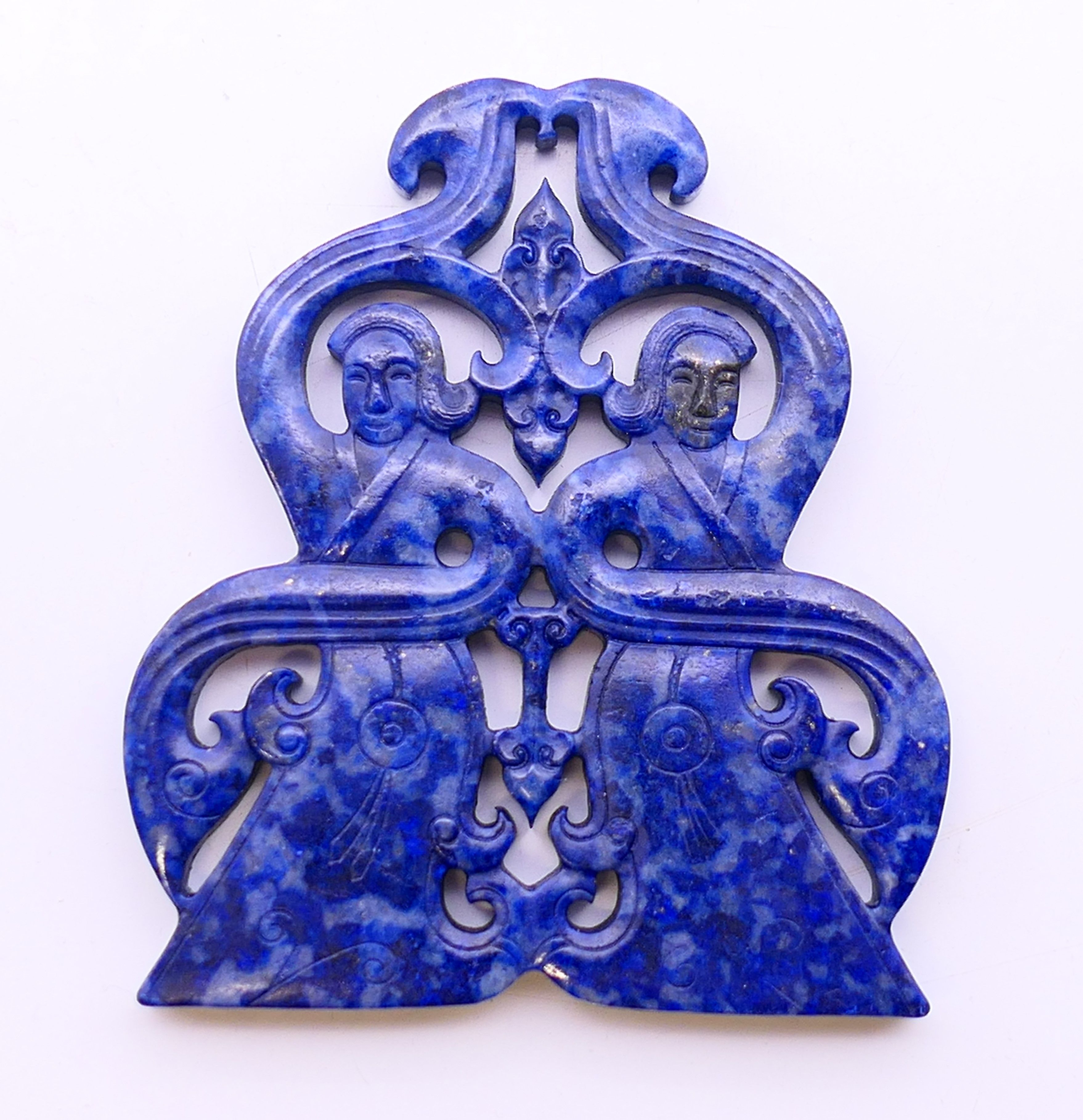 A lapiz amulet. 7 cm high.