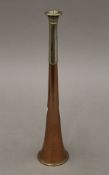A vintage hunting horn by Swaine and Adeney, 85 Piccadilly, London. 24 cm long.