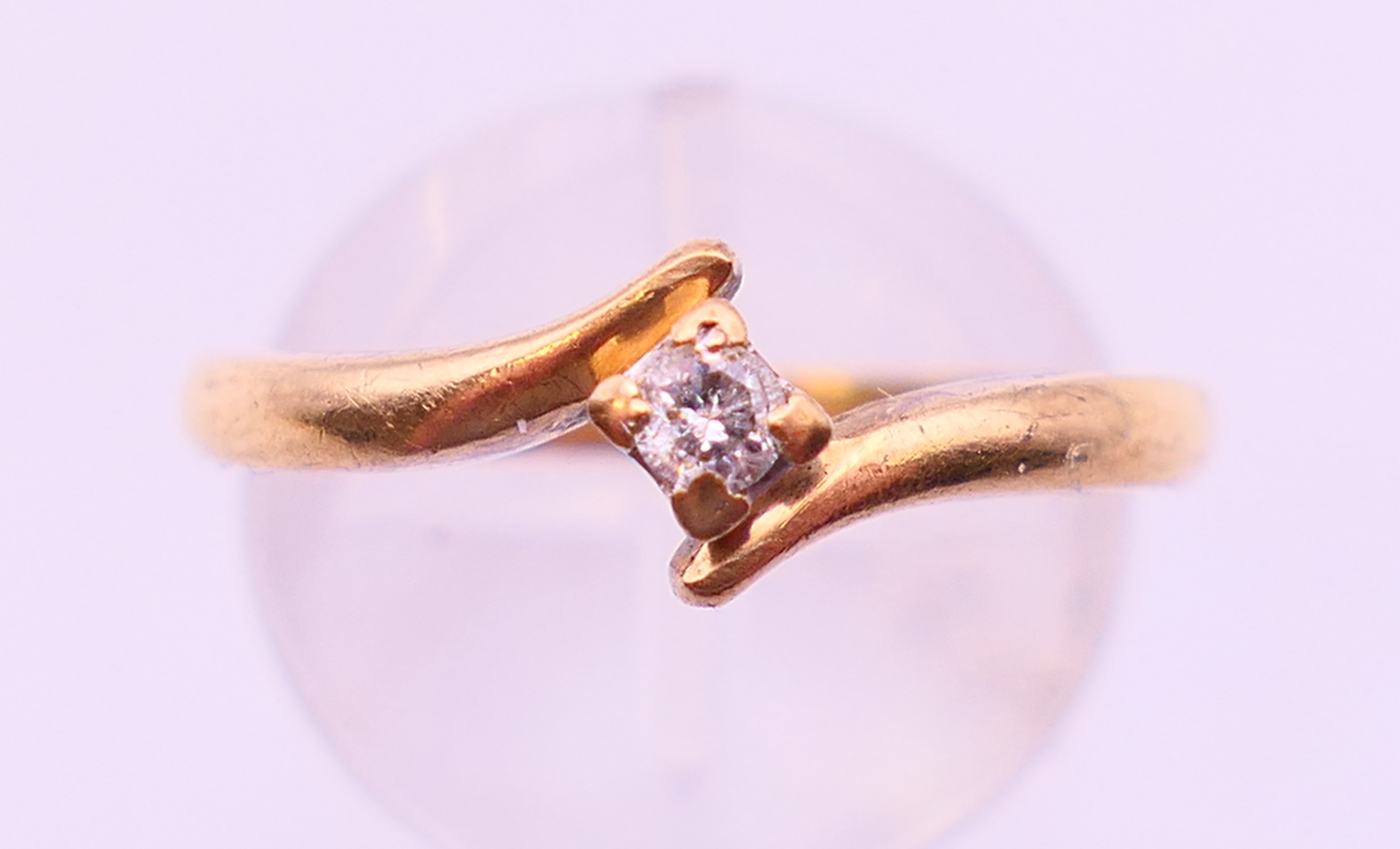 A 9 ct gold diamond ring. Ring size O/P.