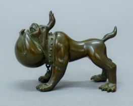 A bronze model of a dog. 8.