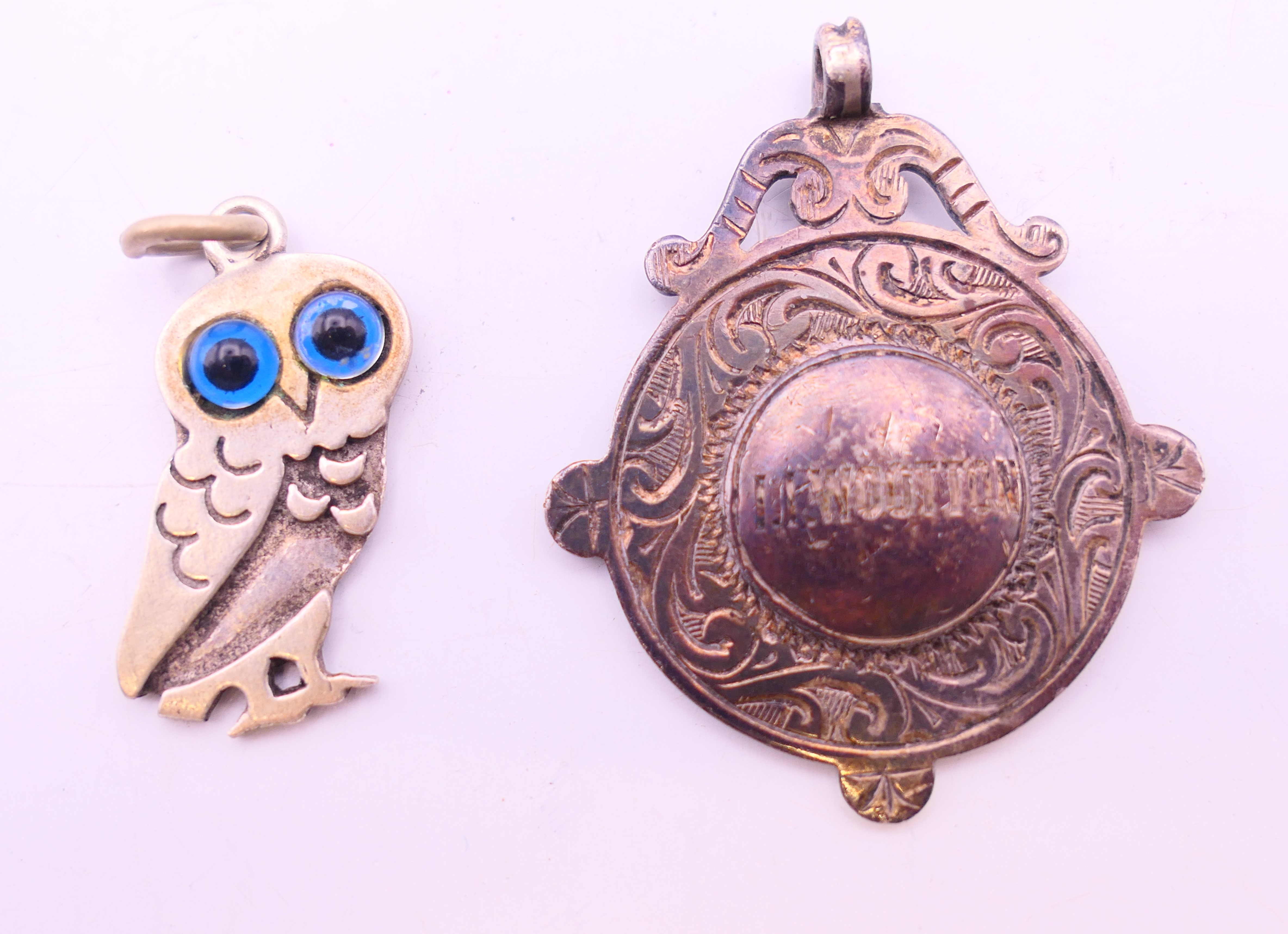 A small quantity of silver jewellery to include a ring, necklace, bracelet, fob and an owl pendant. - Image 4 of 7