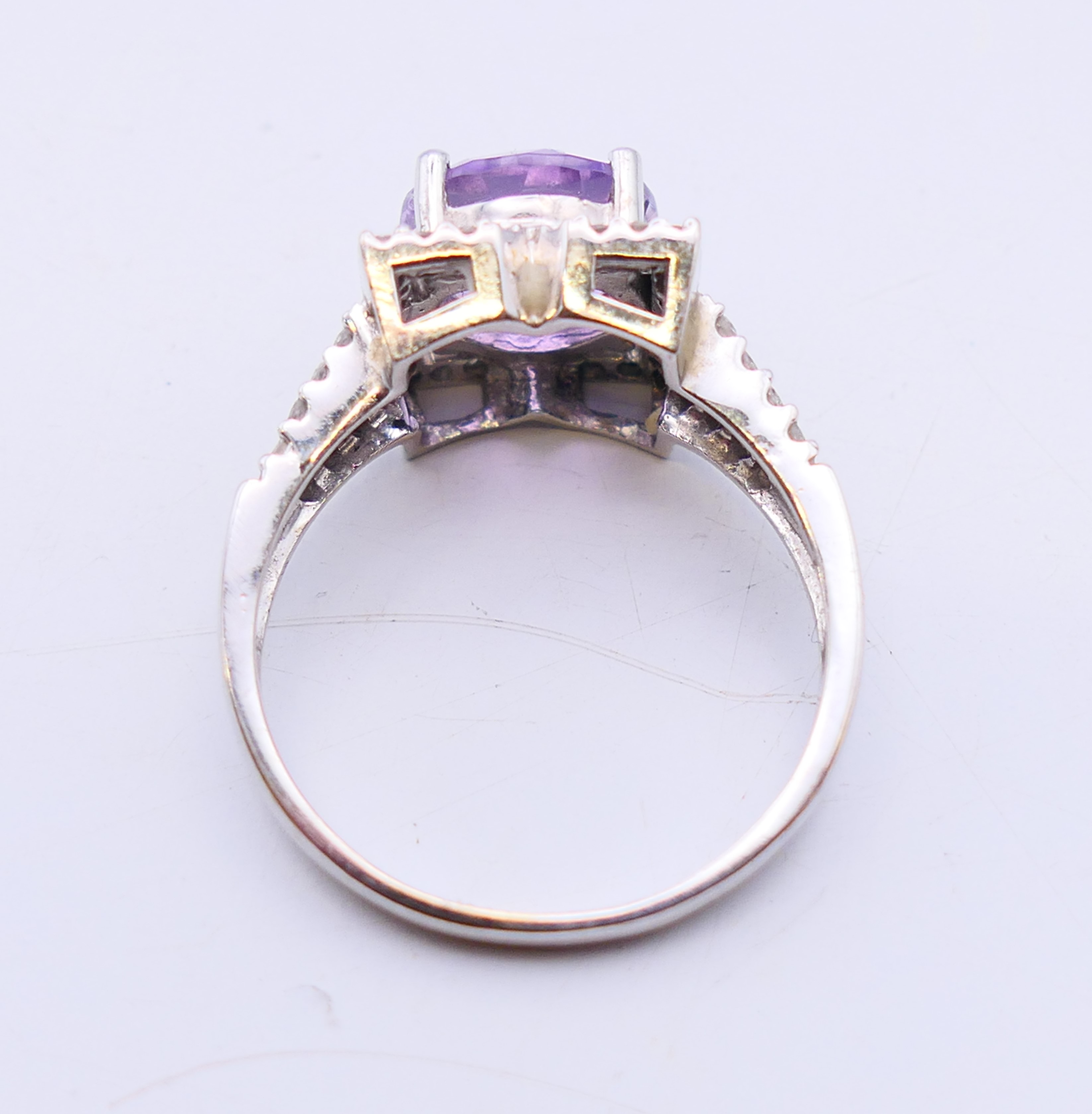 A 9 ct white gold, amethyst and diamond ring. 4.4 grammes. Ring size Q/R. - Image 4 of 5