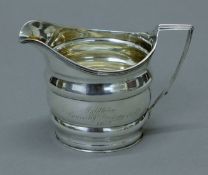 A Georgian silver jug, inscribed Middleton Coursing Meeting Oct 1837 Master of Arts. 9.5 cm high.