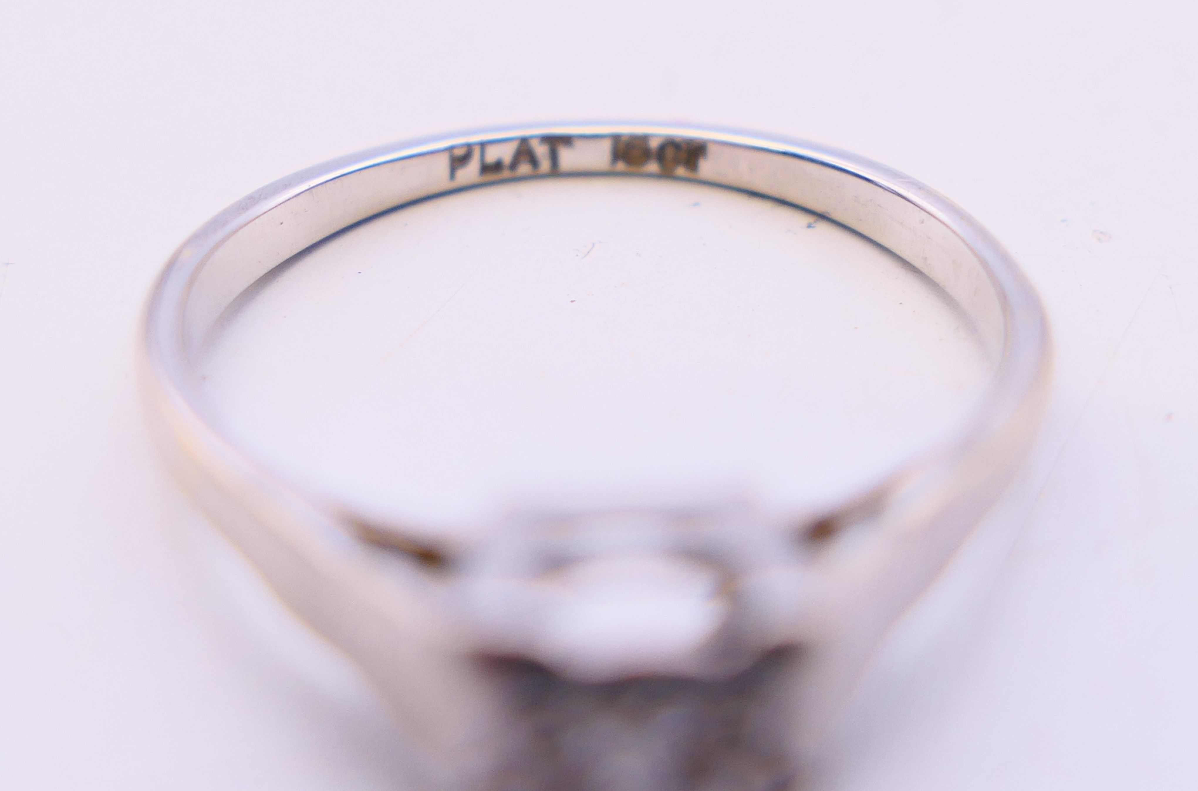 A platinum and diamond solitaire ring. Ring size L/M. - Image 6 of 8