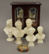 Five various resin busts, a jewellery cabinet and a bracelet. The cabinet 26 cm high.