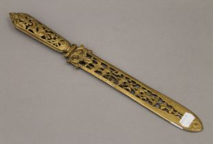 A Victorian ornate brass page turner. 39 cm long.