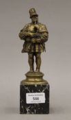 A 19th century gilt bronze figure of a bagpiper on a marble base. 21.5 cm high overall.