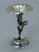 A Japanese silver bud vase. 10 cm high. 86 grammes.