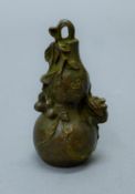 A bronze model of a double gourd. 7 cm high.