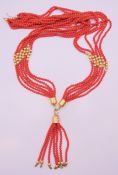 A vintage six-strand bead necklace with silver gilt beads and mounts.