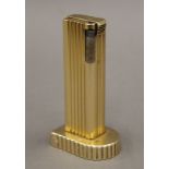 A vintage Benlow Golmet table lighter. 10.5 cm high.