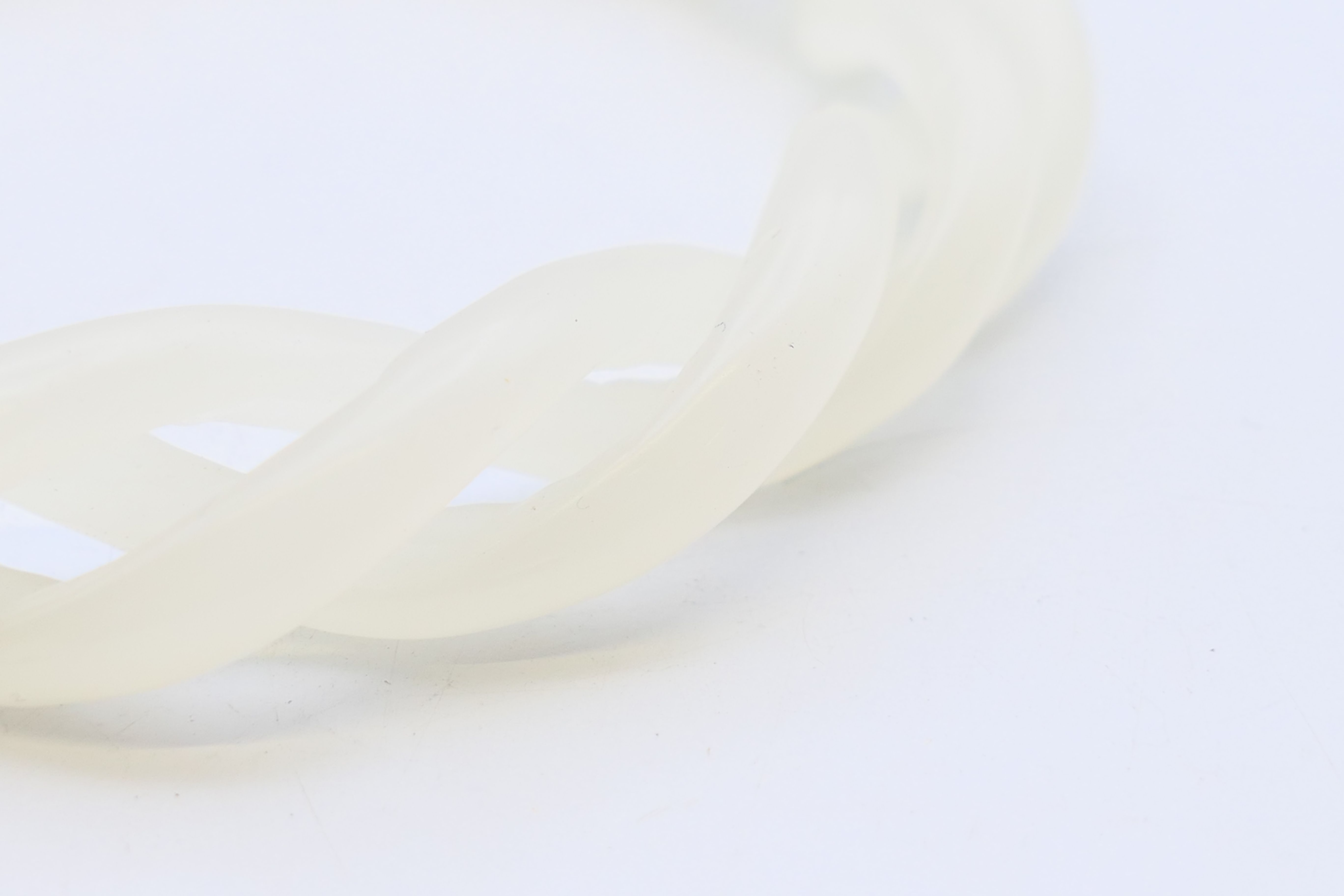 A white jade triple twist bangle. 6 cm internal diameter, 9 cm external diameter. - Image 2 of 3