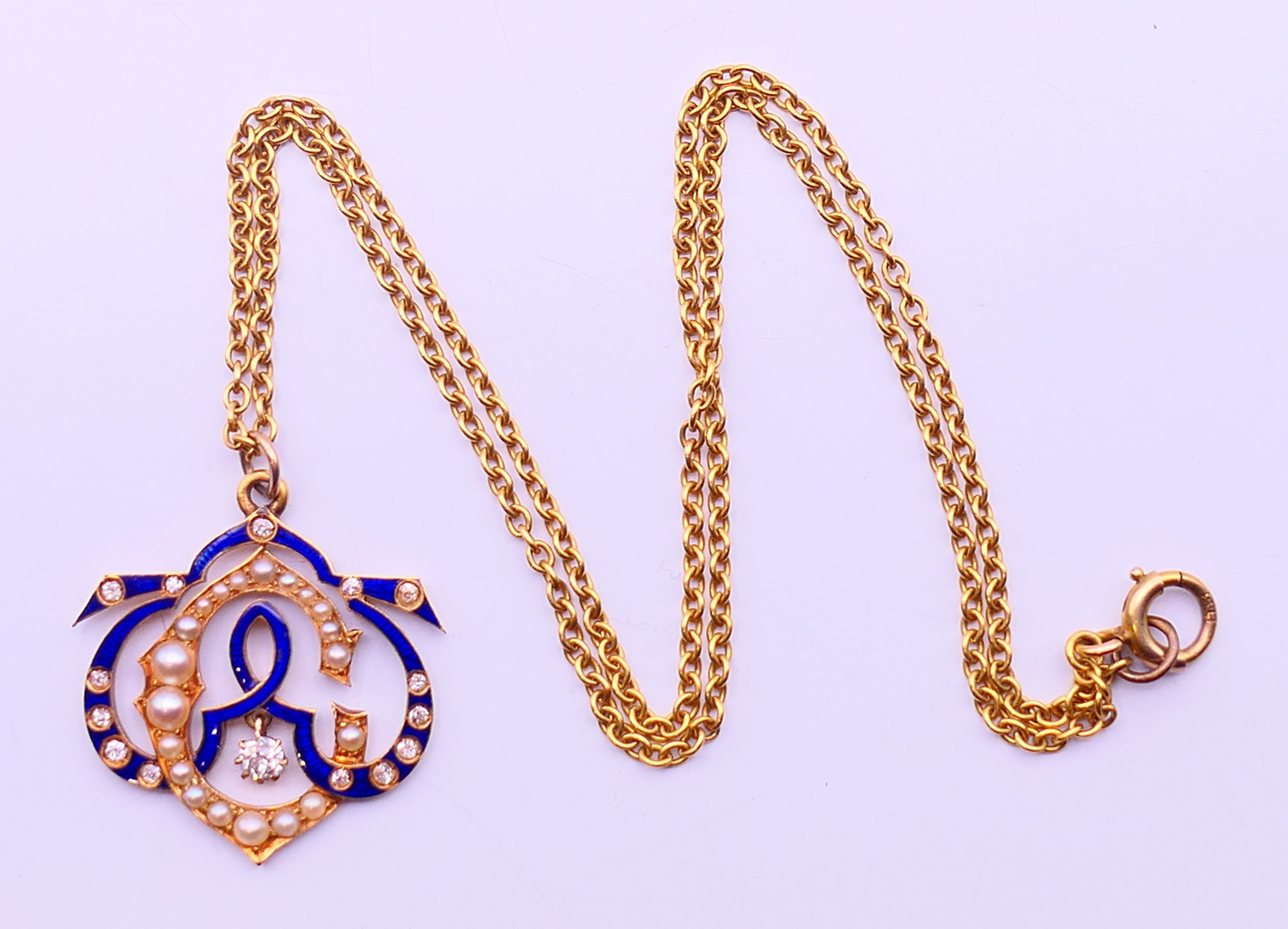 An unmarked, diamond, enamel and seed pearl set pendant on a 9 ct gold chain. Pendant 2. - Image 2 of 5