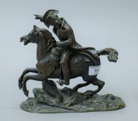 A bronze figure of Napoleon on horseback. 21.5 cm high.