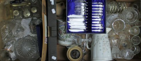 Two boxes of assorted glassware, metal and ceramics.