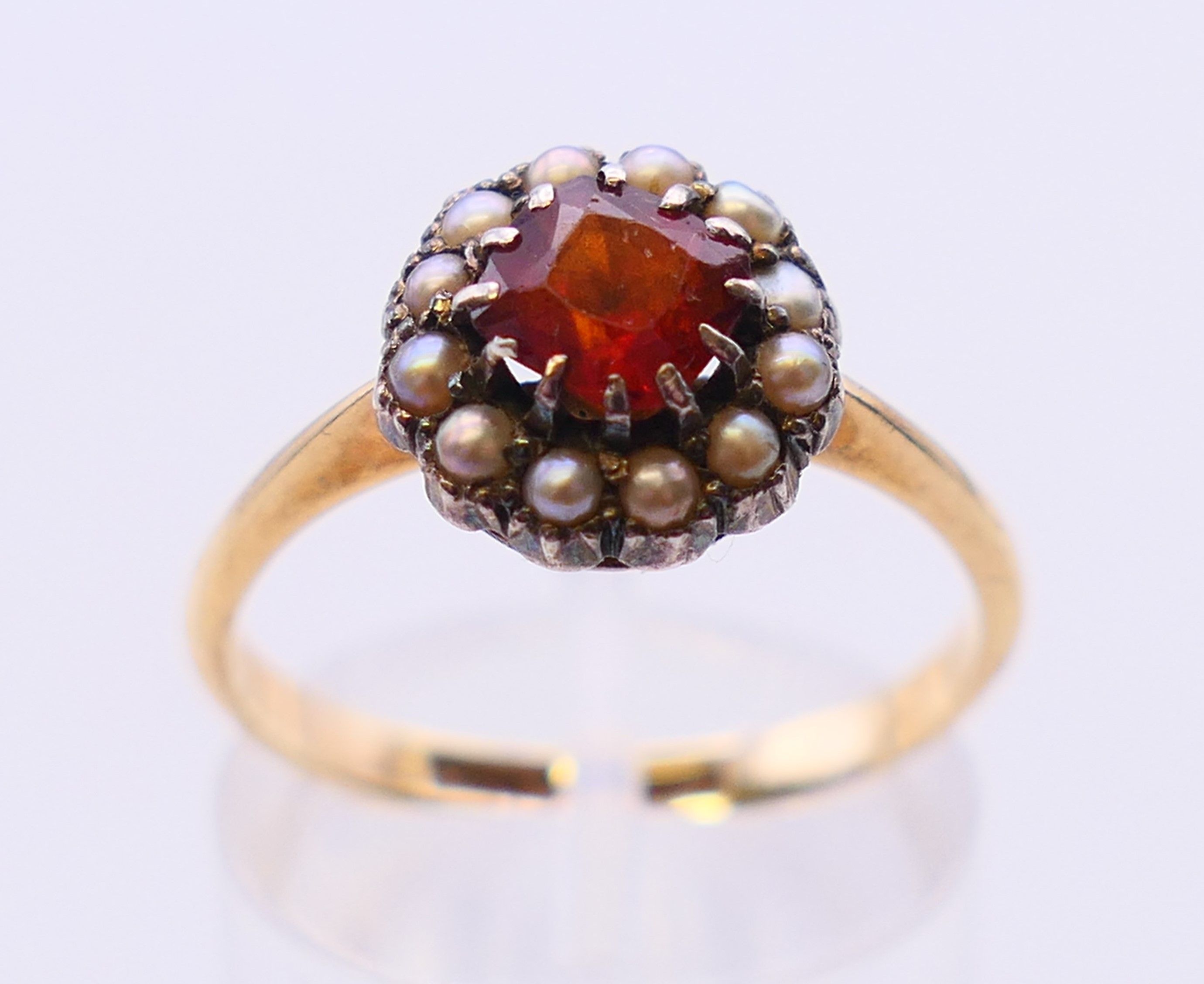 A 9 ct gold, seed pearl and garnet ring. Ring size O/P. - Image 2 of 7