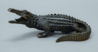 A bronze crocodile. 23.5 cm long.