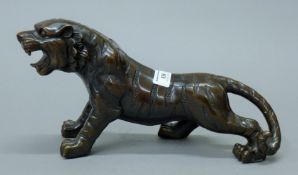 A bronze tiger. 33 cm long.