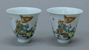 A pair of Chinese porcelain wine cups. 7 cm high.