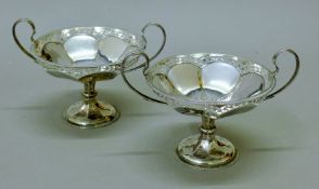 A pair of silver twin-handled tazzas. 18 cm wide. 387.6 grammes.