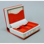 A bridge box formed as a book stamped Asprey. 13.5 cm wide.