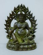 A small bronze figure of a deity with halo. 11 cm high.