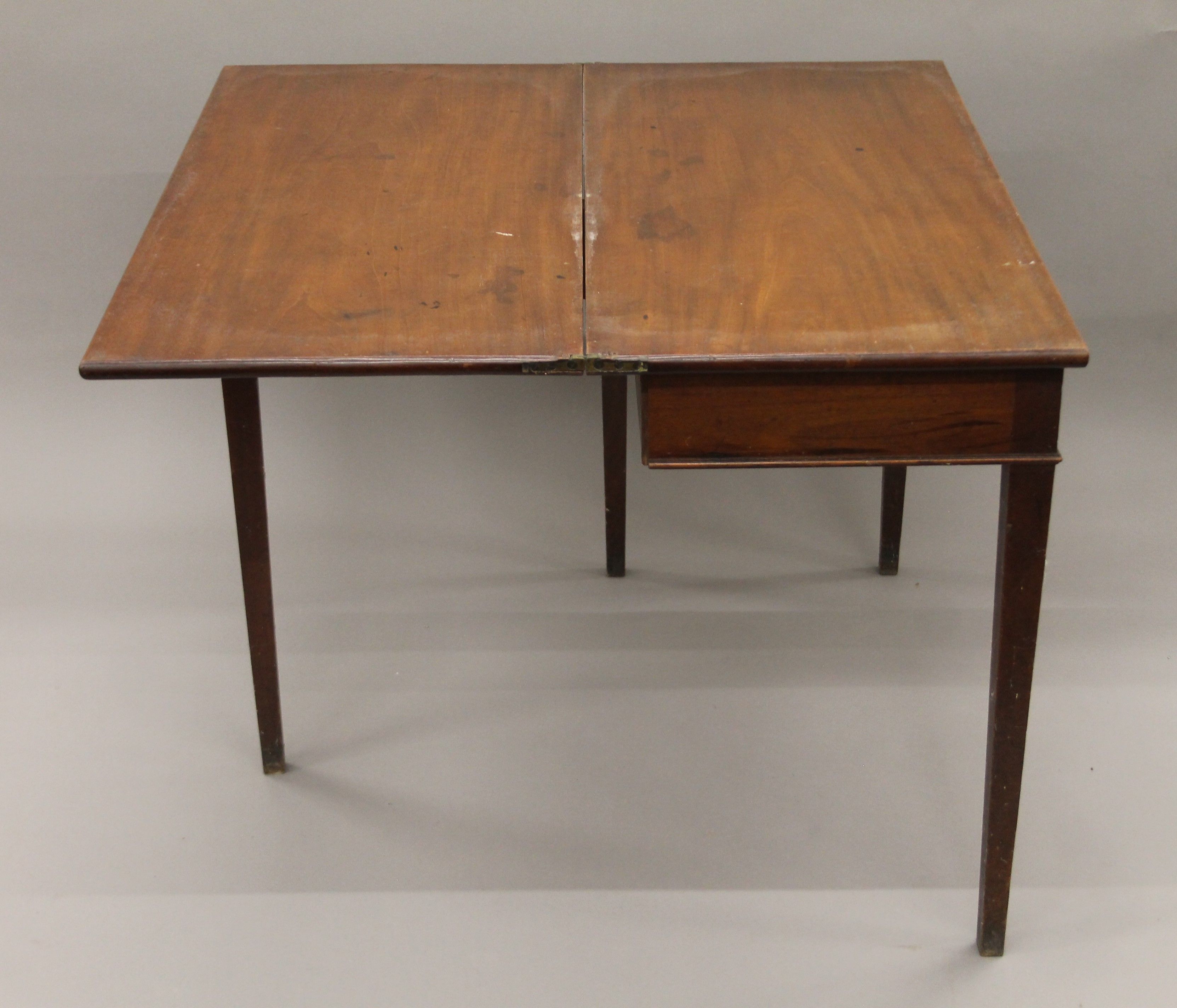 A 19th century mahogany fold-over tea table. 93.5 cm wide. - Image 3 of 5