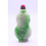 A jade snuff bottle and stopper. 7 cm high.